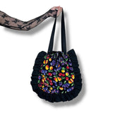 gloomy fruits quilted drawstring tote bag